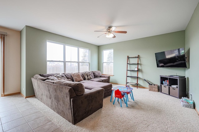10941 Preston Pkwy, Huntley, IL 60142 - living room with ceiling fan, baseboards, and tile patterned flooring