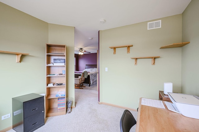 10941 Preston Pkwy, Huntley, IL 60142 - home office with light colored carpet, a ceiling fan, and baseboards