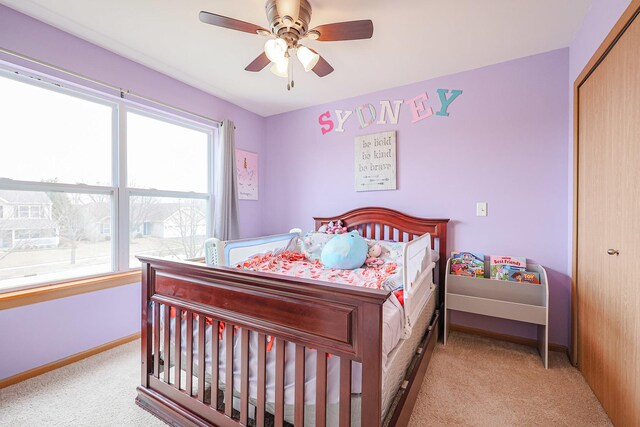 10941 Preston Pkwy, Huntley, IL 60142 - carpeted bedroom with baseboards, a ceiling fan, and a closet