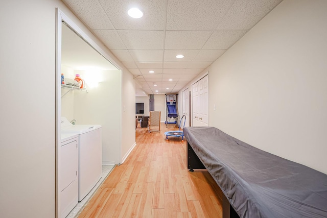 10941 Preston Pkwy, Huntley, IL 60142 - hallway with independent washer and dryer, light wood finished floors, recessed lighting, and a paneled ceiling