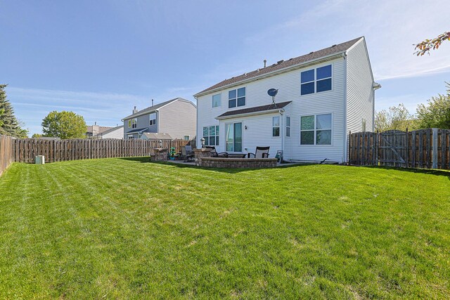 10941 Preston Pkwy, Huntley, IL 60142 - back of property with a patio area and a gate