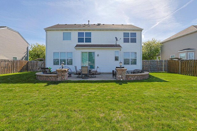 10941 Preston Pkwy, Huntley, IL 60142 - back of house with a patio and a fire pit