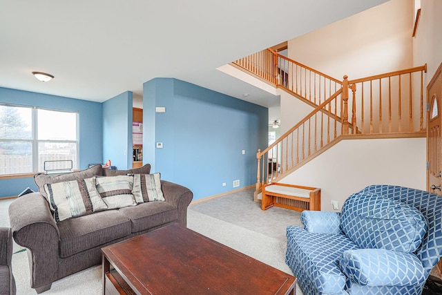 10941 Preston Pkwy, Huntley, IL 60142 - carpeted living area featuring stairs and baseboards