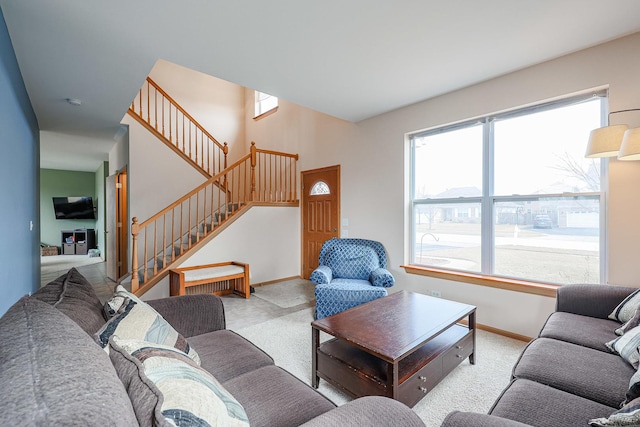 10941 Preston Pkwy, Huntley, IL 60142 - living area featuring carpet, stairs, and baseboards
