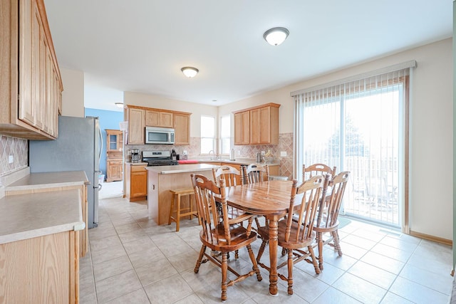 10941 Preston Pkwy, Huntley, IL 60142 - dining area featuring light tile patterned floors