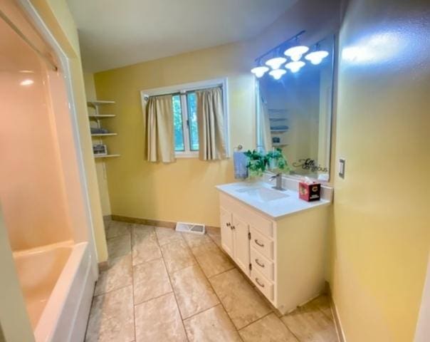 4775 Douglas Rd, Oswego, IL 60543 - full bath featuring tile patterned floors, vanity, a bath, and a shower