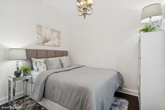 2328 N Oakley Ave Unit 2E, Chicago, IL 60647 - bedroom with baseboards and wood finished floors