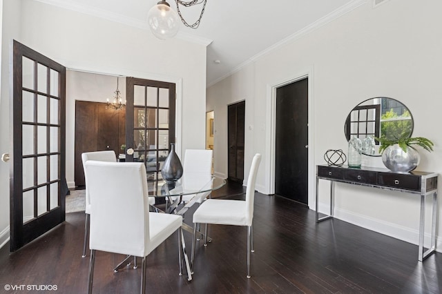 2328 N Oakley Ave Unit 2E, Chicago, IL 60647 - dining room with a chandelier, wood finished floors, crown molding, and baseboards