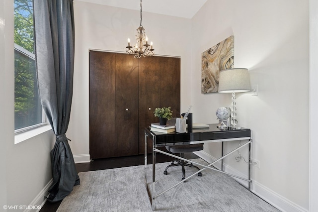 2328 N Oakley Ave Unit 2E, Chicago, IL 60647 - office with a chandelier, baseboards, and wood finished floors