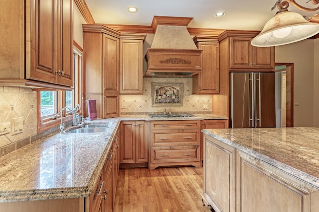 25410 N Cayuga Trl, Lake Barrington, IL 60010 - kitchen featuring appliances with stainless steel finishes, a sink, custom exhaust hood, light stone counters, and recessed lighting