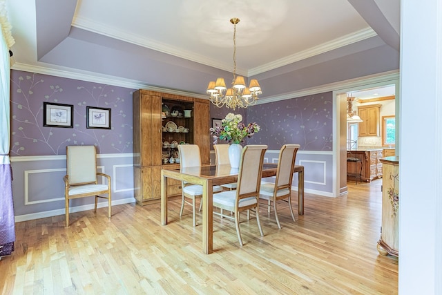 25410 N Cayuga Trl, Lake Barrington, IL 60010 - dining area featuring wainscoting, light wood finished floors, a chandelier, ornamental molding, and wallpapered walls
