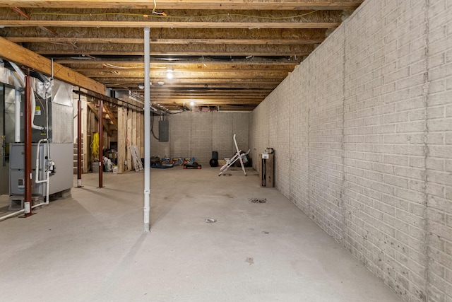2011 Medical Center Dr, Monticello, IL 61856 - unfinished basement featuring electric panel and heating unit