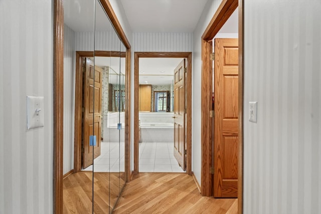 16 Pine Needles Dr, Lemont, IL 60439 - corridor featuring wallpapered walls and light wood finished floors