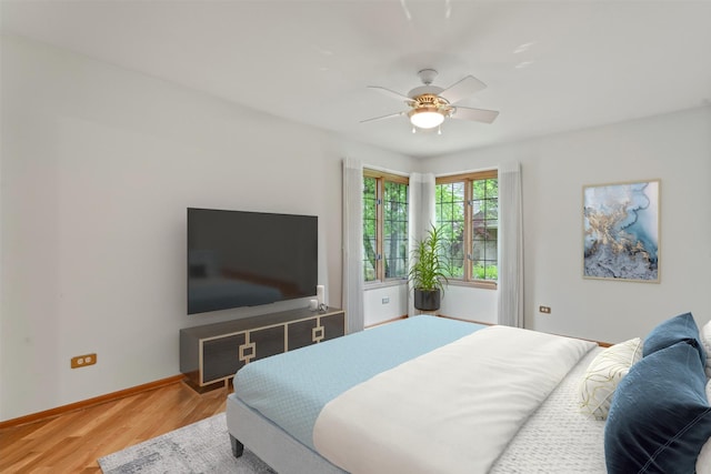 16 Pine Needles Dr, Lemont, IL 60439 - bedroom featuring wood finished floors, baseboards, and ceiling fan