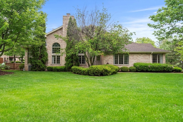 16 Pine Needles Dr, Lemont, IL 60439 - view of front facade featuring brick siding and a chimney