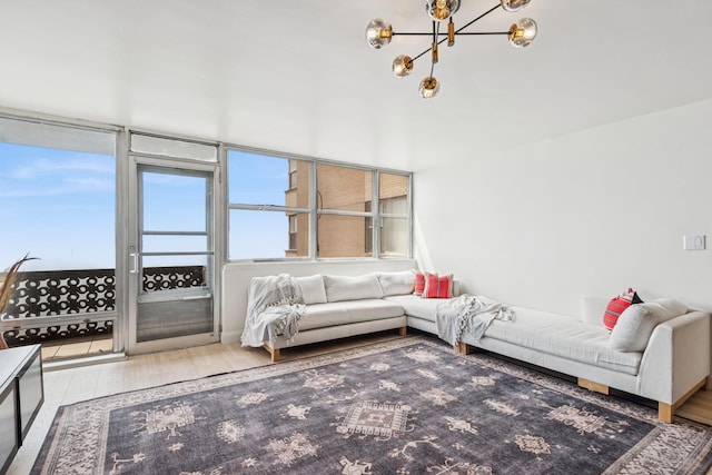 6301 N Sheridan Rd Unit 17J, Chicago, IL 60660 - living area featuring wood finished floors and a chandelier