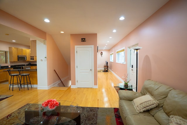 4310 Church St, Skokie, IL 60076 - living room with light wood-type flooring, recessed lighting, and baseboards