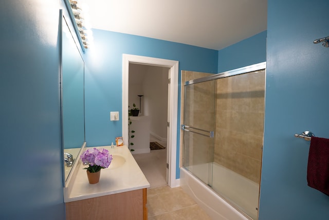 4310 Church St, Skokie, IL 60076 - bathroom featuring tile patterned flooring, vanity, and shower / bath combination with glass door