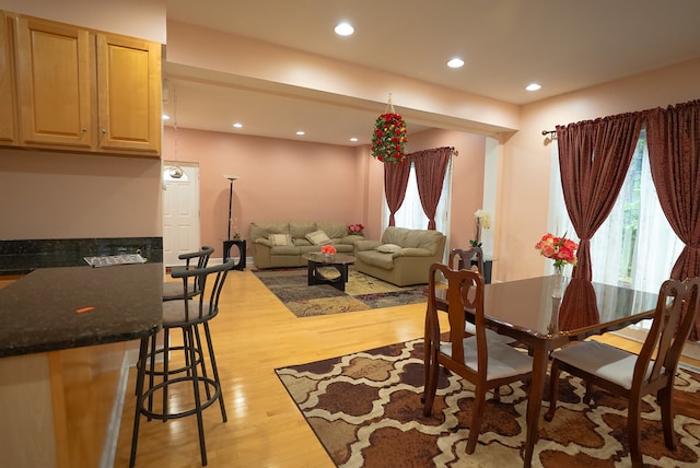 4310 Church St, Skokie, IL 60076 - dining area featuring light wood-style floors, recessed lighting, and bar