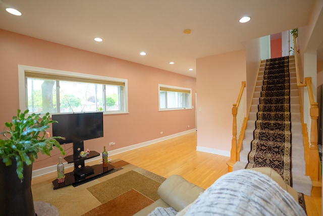 4310 Church St, Skokie, IL 60076 - living area featuring light wood-type flooring, stairway, recessed lighting, and baseboards