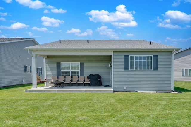 25549 Sara Ct, Channahon, IL 60410 - back of house with a patio and a lawn