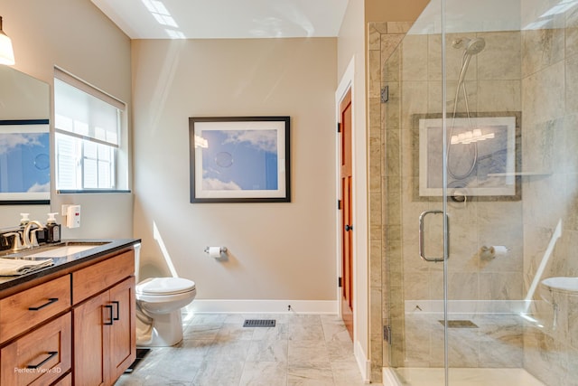 25549 Sara Ct, Channahon, IL 60410 - bathroom with a stall shower, vanity, marble finish flooring, toilet, and baseboards