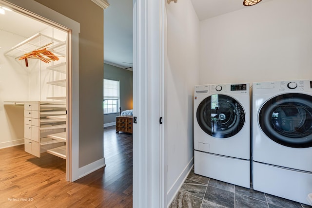 25549 Sara Ct, Channahon, IL 60410 - laundry room with washer and clothes dryer, baseboards, and wood finished floors