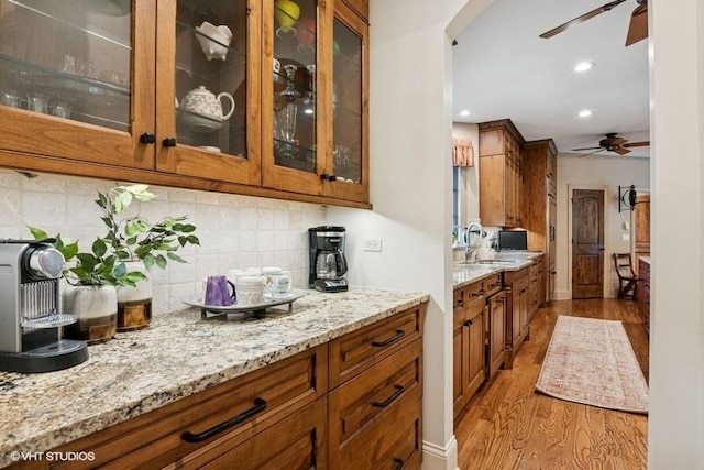 41W590 Bowgren Dr, Campton Hills, IL 60119 - bar with ceiling fan, light wood-style flooring, a sink, tasteful backsplash, and recessed lighting