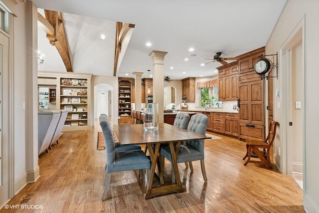 41W590 Bowgren Dr, Campton Hills, IL 60119 - dining space with ceiling fan, ornate columns, arched walkways, light wood finished floors, and recessed lighting