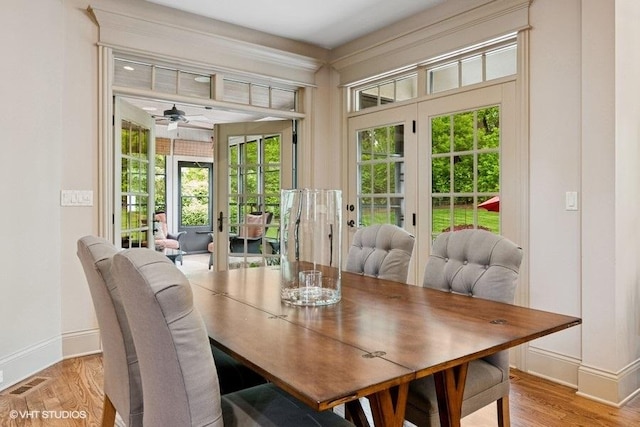 41W590 Bowgren Dr, Campton Hills, IL 60119 - dining area with baseboards, ceiling fan, and wood finished floors