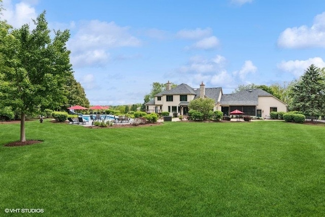 41W590 Bowgren Dr, Campton Hills, IL 60119 - view of green lawn featuring a swimming pool