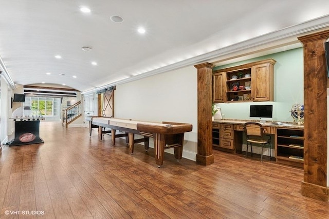 41W590 Bowgren Dr, Campton Hills, IL 60119 - recreation room with lofted ceiling, decorative columns, wood-type flooring, recessed lighting, and baseboards