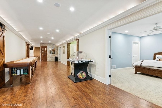 41W590 Bowgren Dr, Campton Hills, IL 60119 - recreation room with wood-type flooring, vaulted ceiling, recessed lighting, ceiling fan, and baseboards