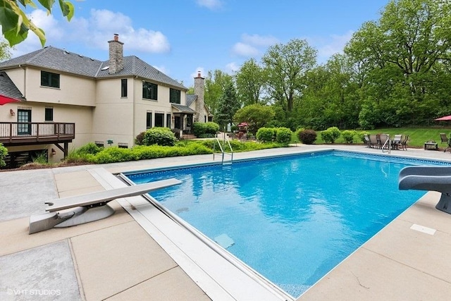 41W590 Bowgren Dr, Campton Hills, IL 60119 - swimming pool featuring a water slide, a diving board, and a patio