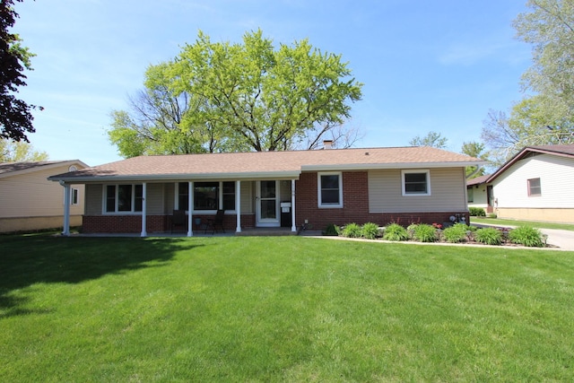 1188 Cypress Ln, Elk Grove Village, IL 60007 - ranch-style home featuring brick siding, a front yard, and a porch