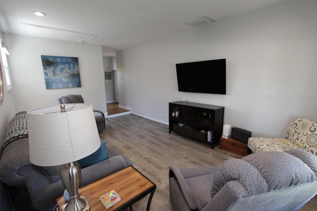 1188 Cypress Ln, Elk Grove Village, IL 60007 - living area with attic access, wood finished floors, and baseboards
