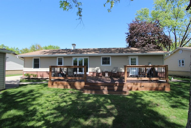 1188 Cypress Ln, Elk Grove Village, IL 60007 - back of property featuring a yard, brick siding, and roof with shingles