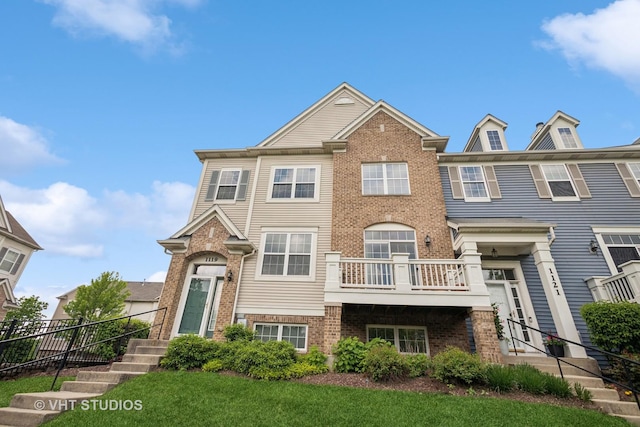 1119 Orangery Ct, Carol Stream, IL 60188 - view of front of property with brick siding and a balcony