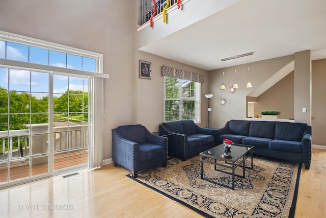 1119 Orangery Ct, Carol Stream, IL 60188 - living room with hardwood / wood-style floors and a towering ceiling