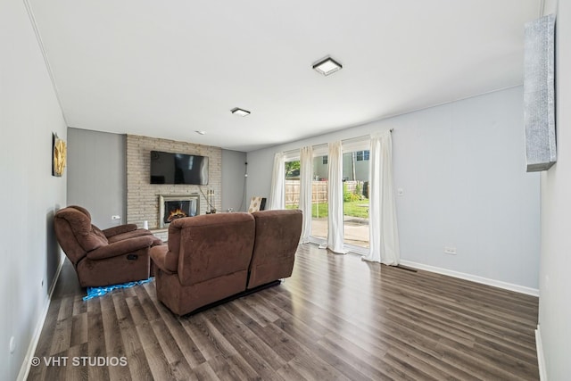 1826 E Tano Ln, Mount Prospect, IL 60056 - living room featuring dark wood-type flooring and a large fireplace