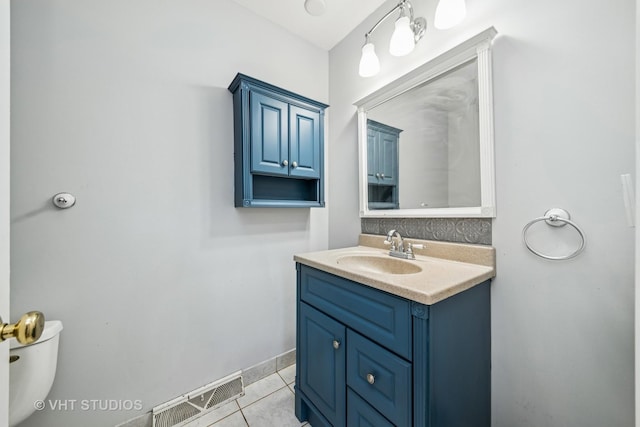 1826 E Tano Ln, Mount Prospect, IL 60056 - bathroom with vanity, backsplash, and tile patterned floors