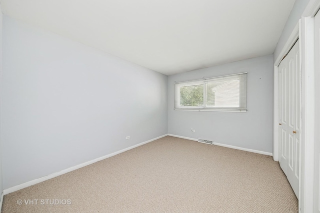 1826 E Tano Ln, Mount Prospect, IL 60056 - unfurnished bedroom featuring carpet floors and a closet