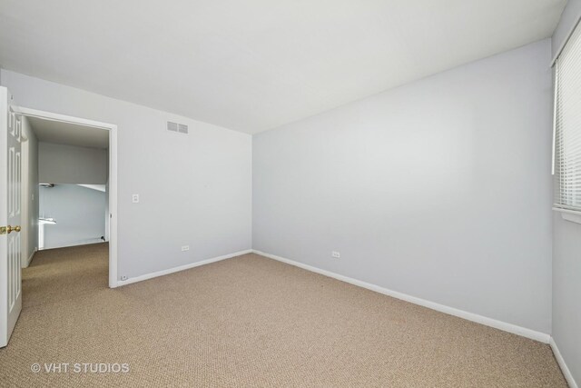1826 E Tano Ln, Mount Prospect, IL 60056 - unfurnished bedroom featuring light colored carpet and baseboards