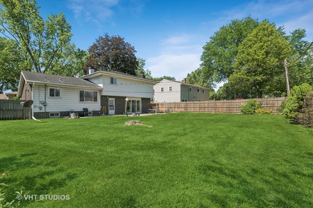 1826 E Tano Ln, Mount Prospect, IL 60056 - rear view of property with a fenced backyard
