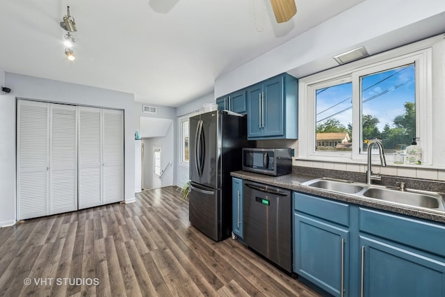 1826 E Tano Ln, Mount Prospect, IL 60056 - kitchen featuring appliances with stainless steel finishes, blue cabinetry, dark countertops, and dark wood-style floors