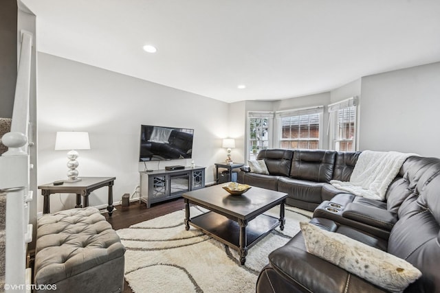 living area with wood finished floors, recessed lighting, and baseboards