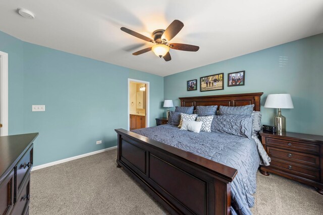 401 Manchester Rd, Oswego, IL 60543 - bedroom featuring light colored carpet, baseboards, a ceiling fan, and connected bathroom