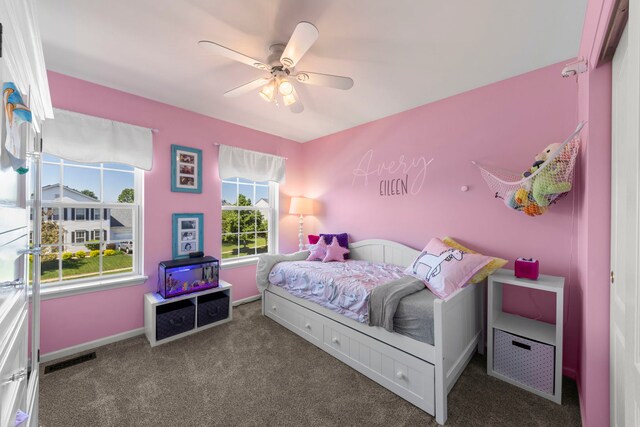 401 Manchester Rd, Oswego, IL 60543 - bedroom with carpet flooring, ceiling fan, and baseboards