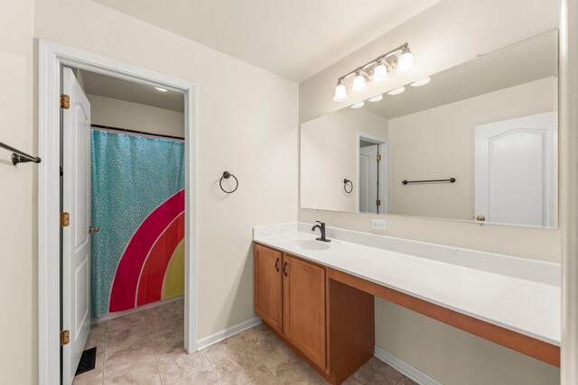 401 Manchester Rd, Oswego, IL 60543 - full bath featuring vanity, baseboards, and tile patterned floors