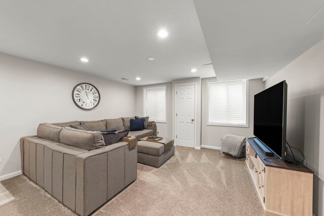 401 Manchester Rd, Oswego, IL 60543 - living room featuring light colored carpet, baseboards, and recessed lighting